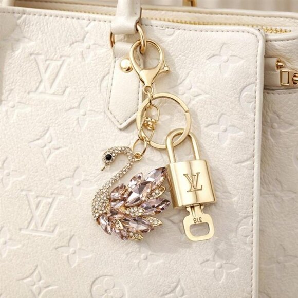 Louis Vuitton Accessories - Authentic Louis Vuitton Gold Padlock & Key with Unbranded Swan Keychain